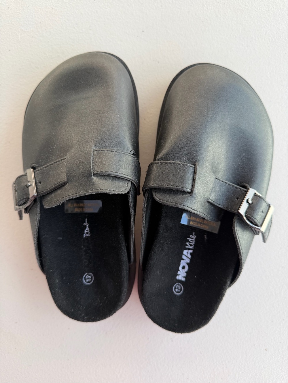 Fashion Nova Kids Black Buckle Slip-On Clogs